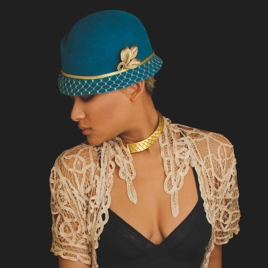 Teal Veiled in Gold